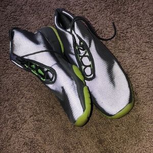 gray and neon jordan’s